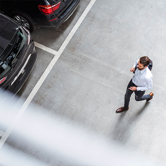 man in a parking garage XProtect Express